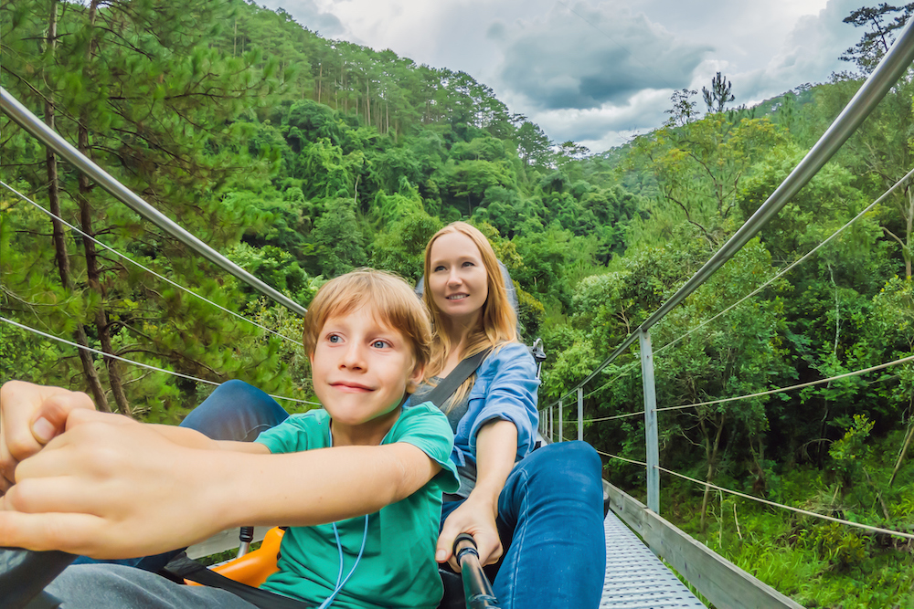 mother and son on alpine coaster