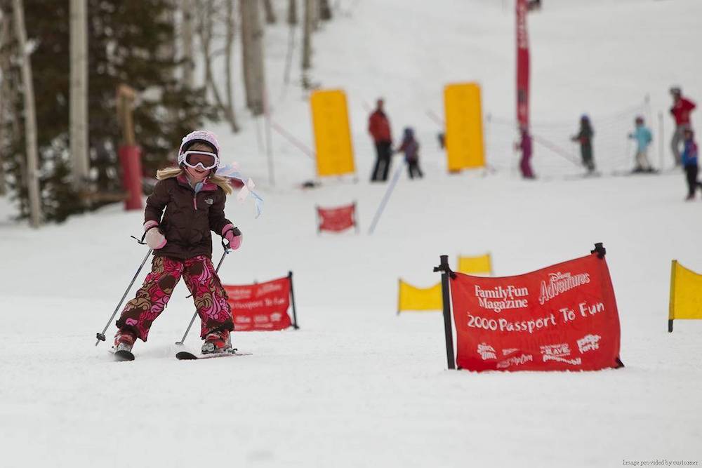 child skiing in snowmass